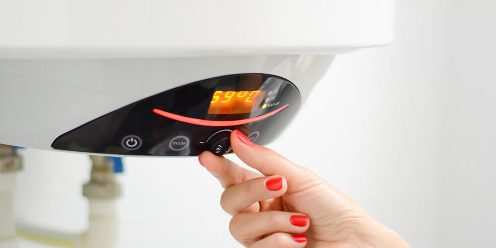 person relighting pilot light