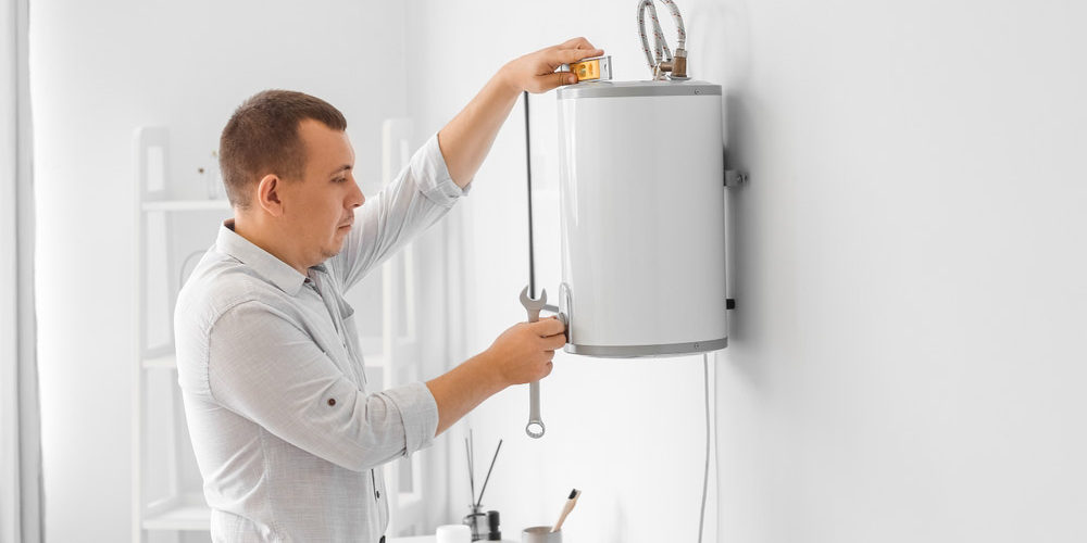 plumber installing water heater